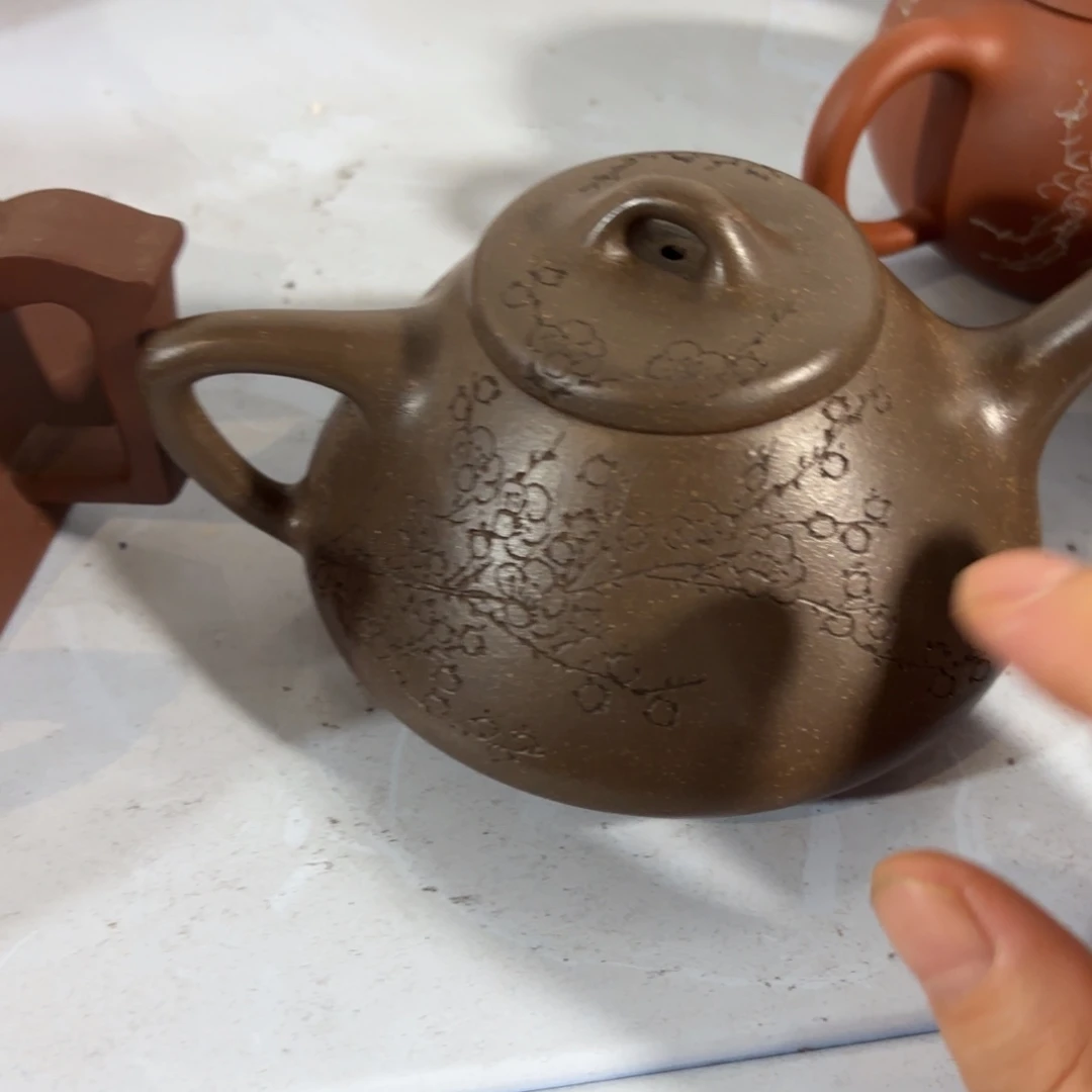 ****乐紫砂茶壶这位朋友是在和一帮年轻