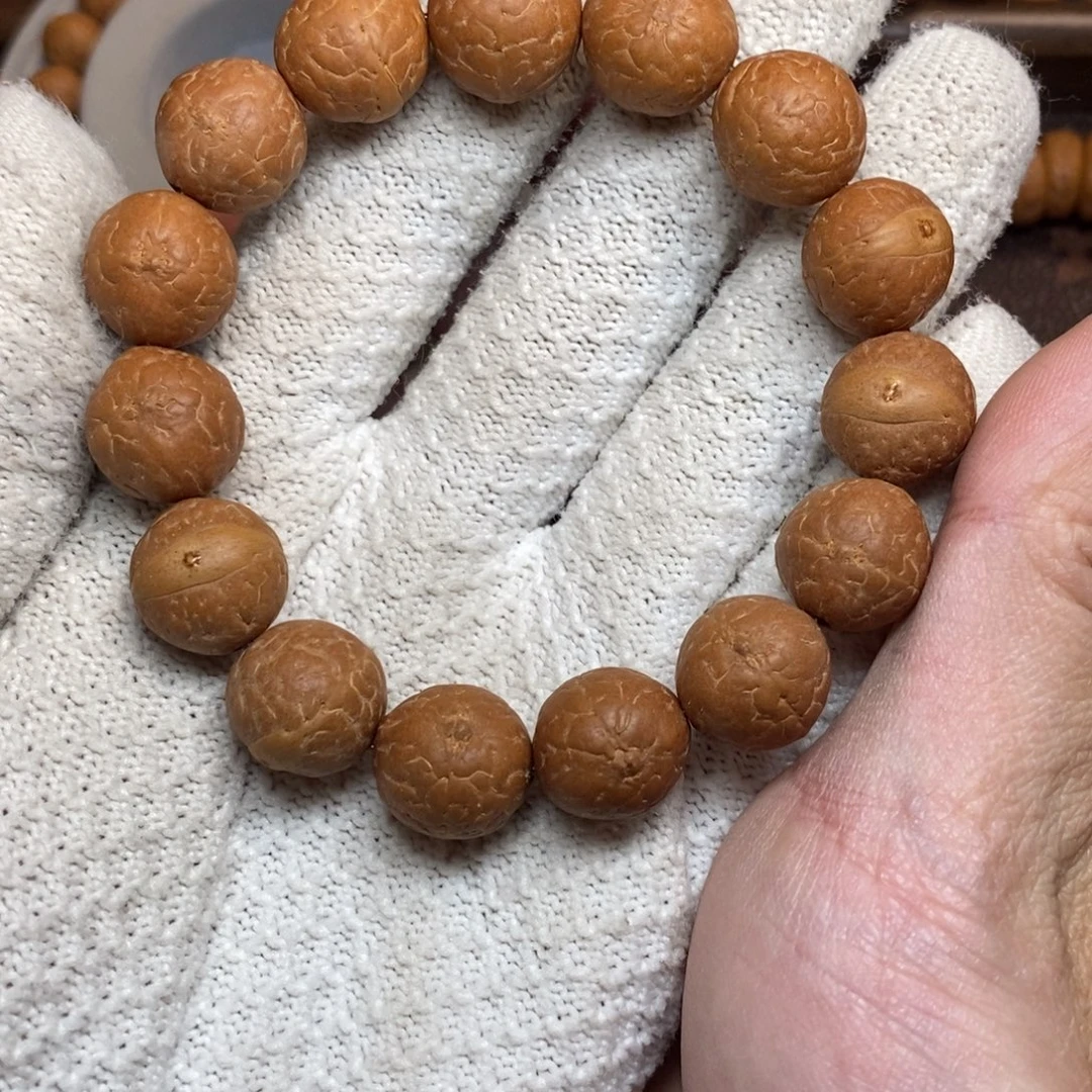 手串凤眼菩提14+红皮金眼单圈