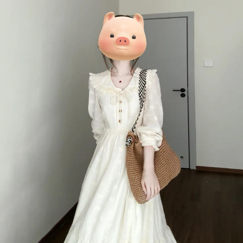 茶歇法式连衣裙子女2025新款温柔风娃娃领气质长裙早秋季气质穿搭