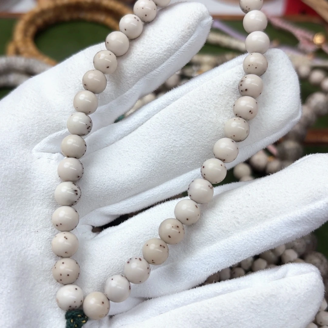 畇****吊坠星月菩提7圆手持金银标