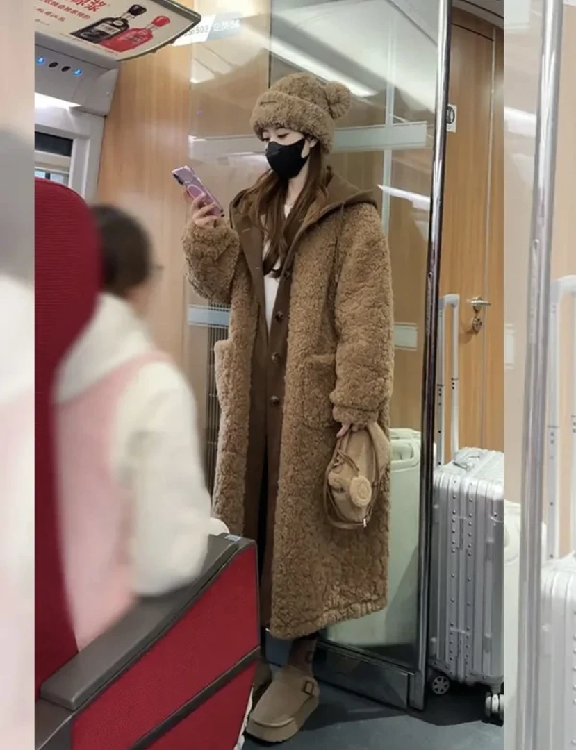 韩版冬日假两件加厚大衣新款女高级感保暖连帽宽松长短款毛毛外套