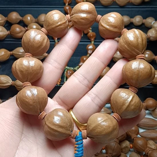 橄榄核手串/手链橄榄核手串铁核蒜头蜜挑臀正圆2.3*2.3左右