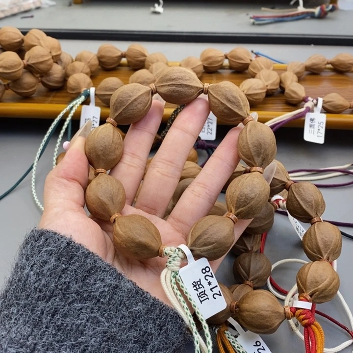 吊坠橄榄核旭***。梅林铁