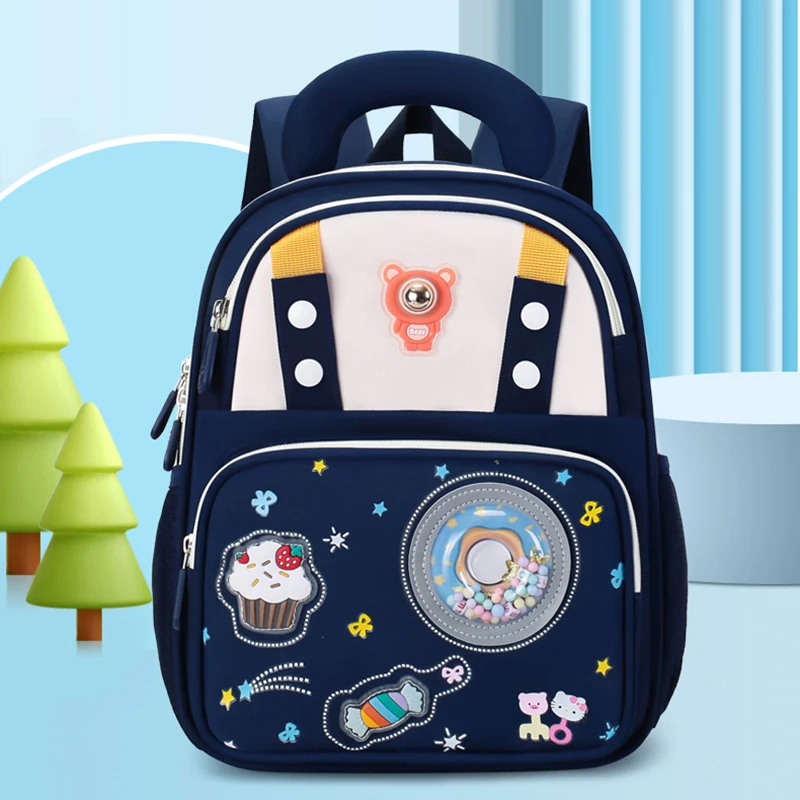亮灯幼儿园甜甜圈书包男女孩入学宝宝新款护脊男生女童大容量背包