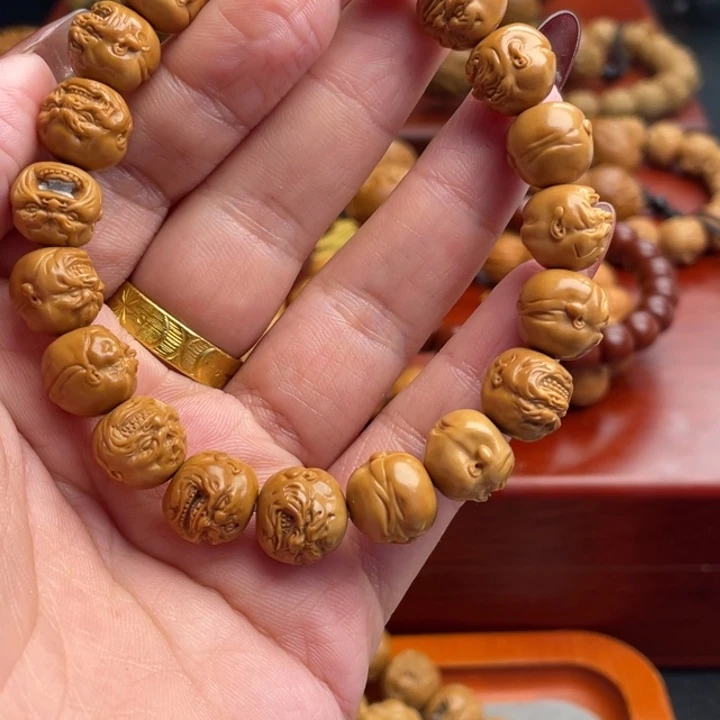 橄榄核吊坠猴头手串