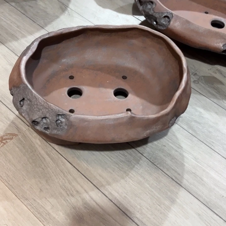 元***爹紫砂花盆宜兴紫砂工艺厂。