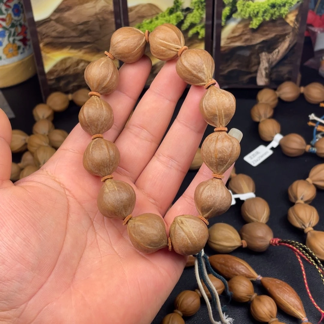 n***7橄榄核手串红肉20mm