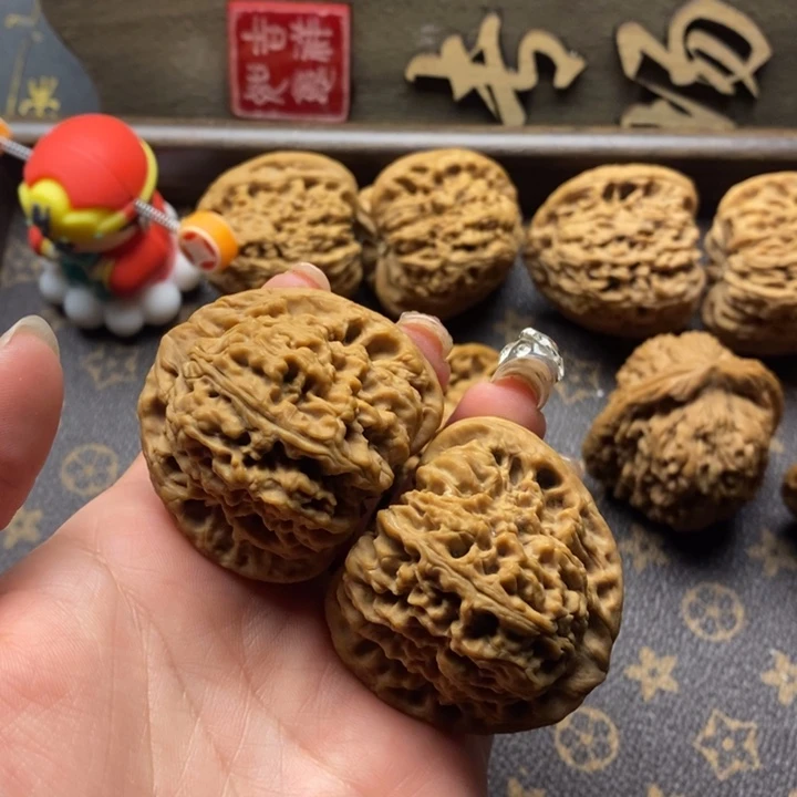 桃核把件泰***起南疆石文玩核桃
