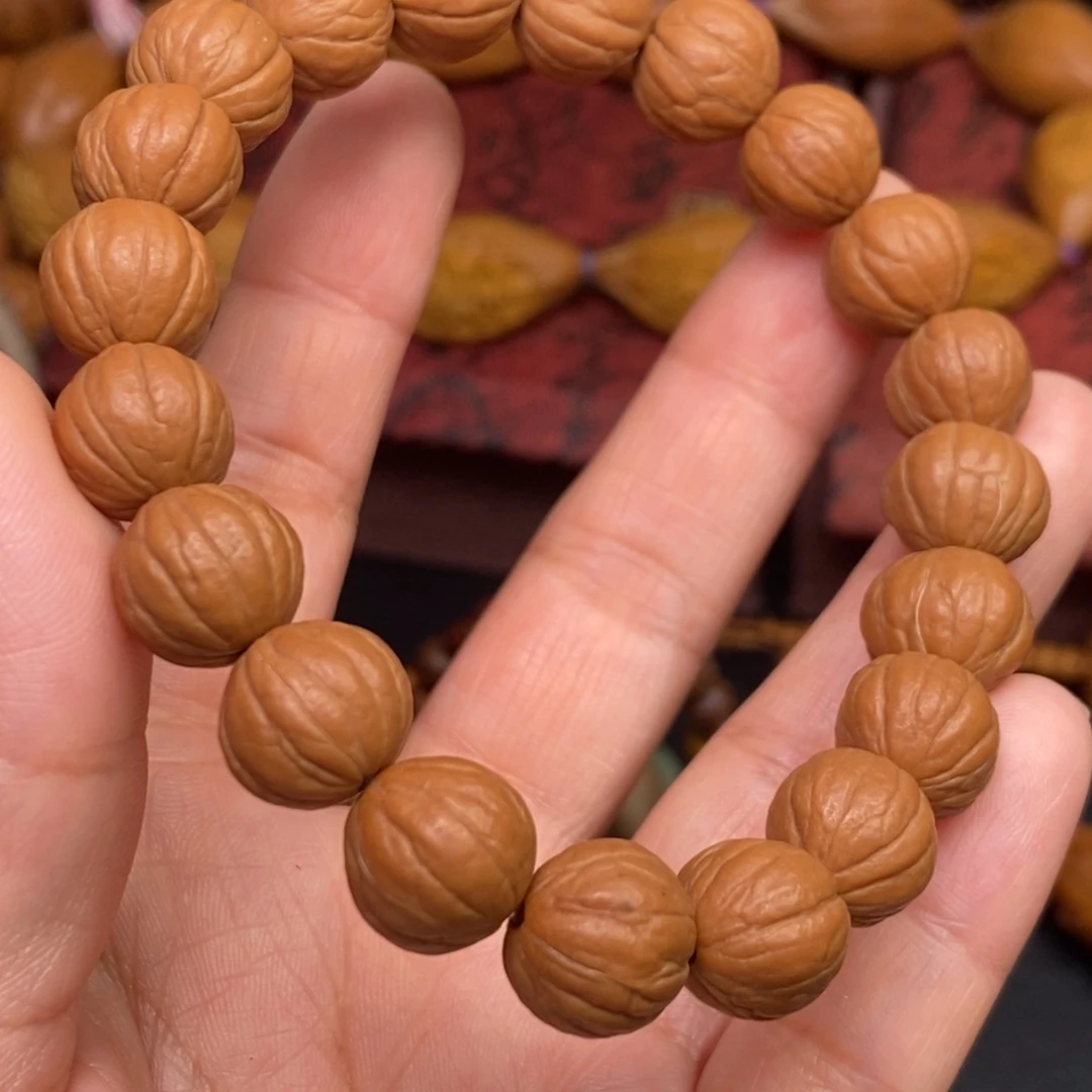 苒***橄榄核吊坠橄榄核雕刻手串