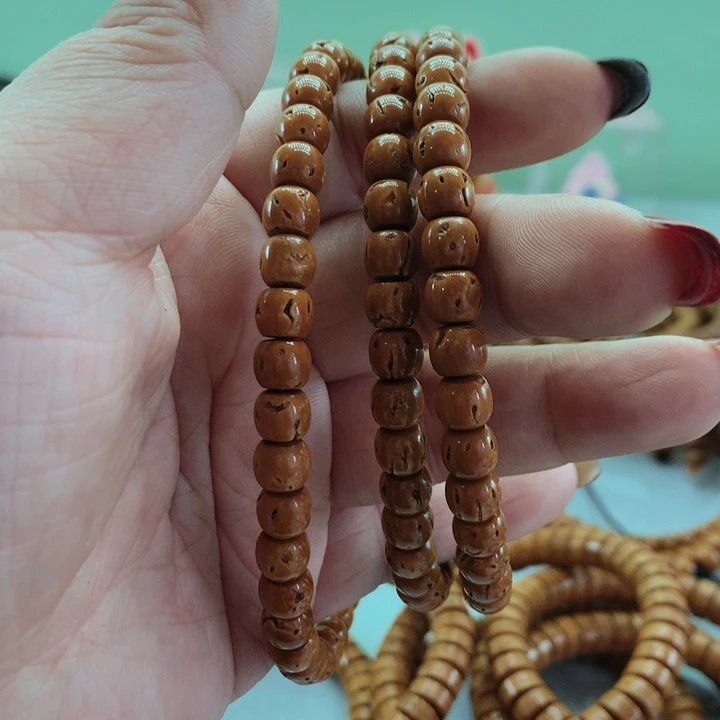 滕****》桃核脖挂精工老型76