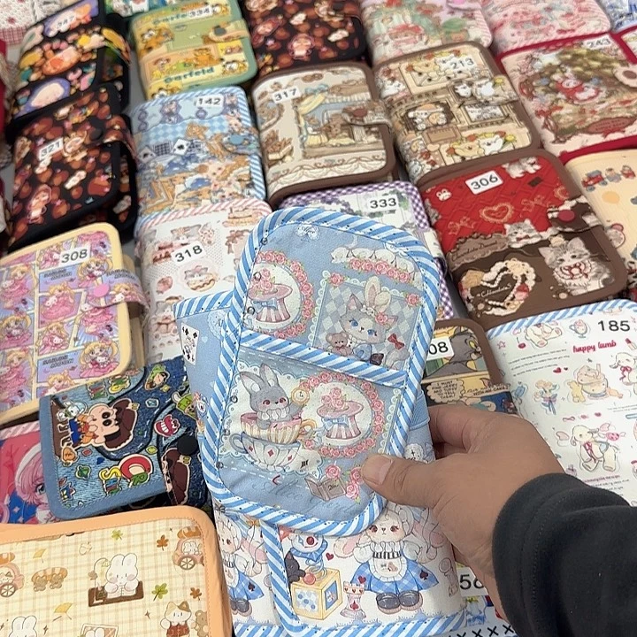 定做三折本子隔页一个