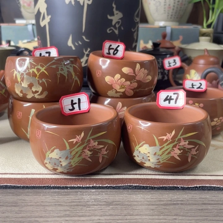 才***财建水紫陶刻填复烧亮光主人杯一只