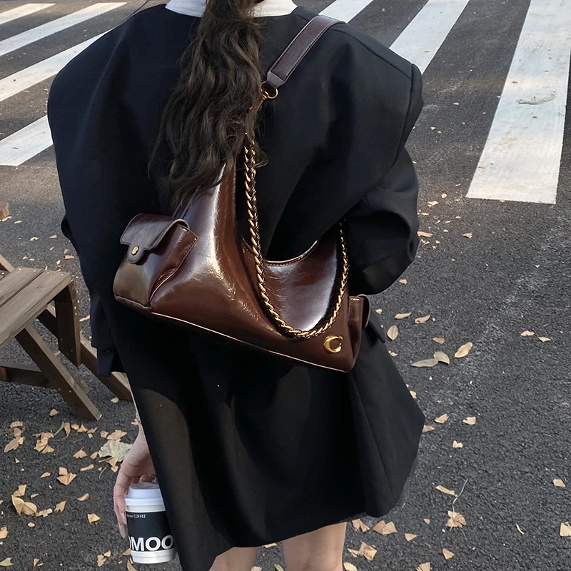 网红腋下包包女2025新款高端轻奢小众高级感通勤大容量斜挎托特包