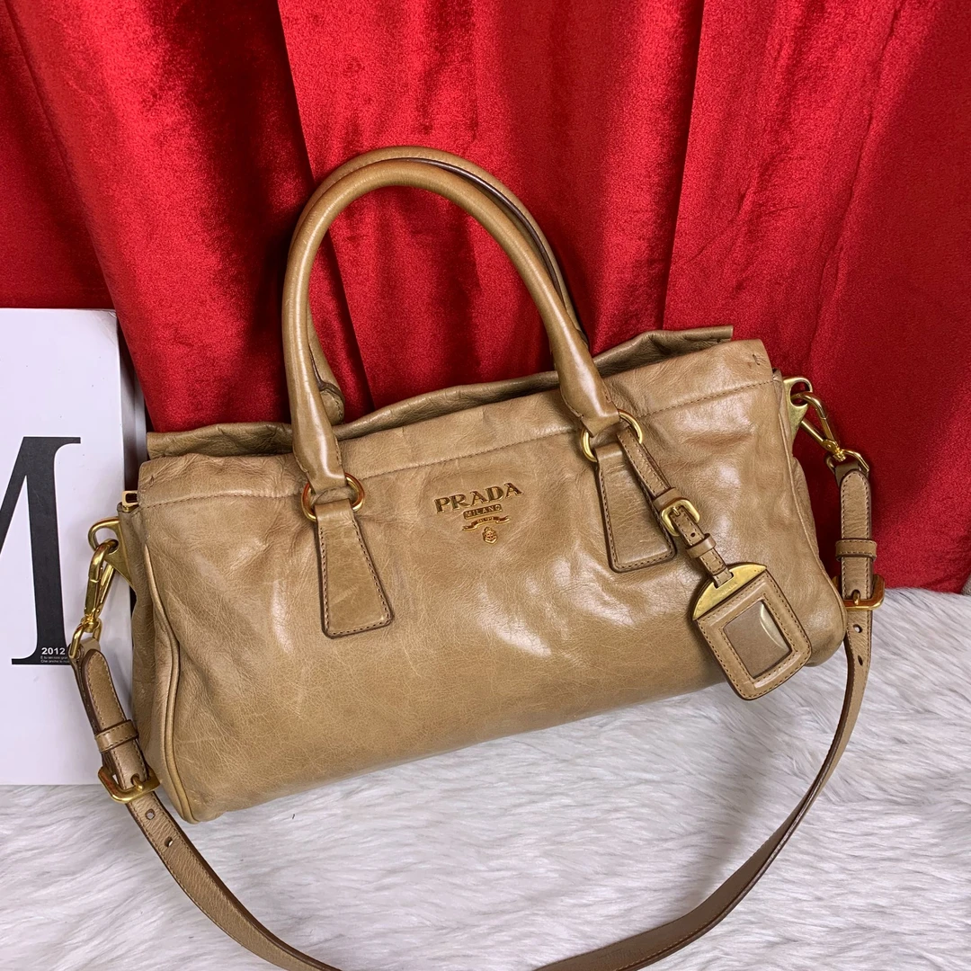 95新 Prada/普拉达 沙漠黄机车包/FYXS09103132/3132