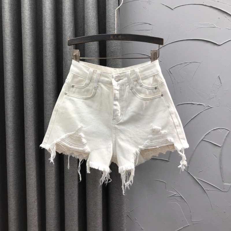 米杏色高腰破洞牛仔短裤女潮流夏天时尚减龄A字百搭辣妹阔腿热裤