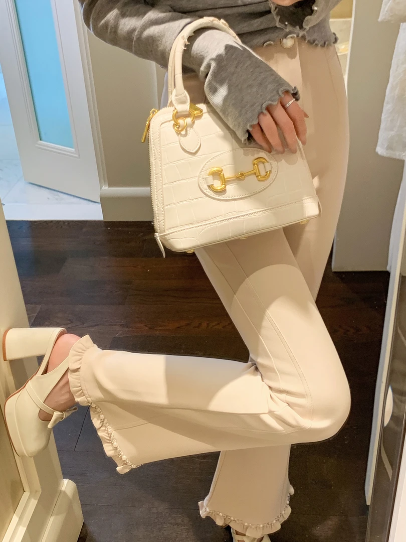 艾日秀2025秋冬设计感高腰木耳边手工钉珠裤脚微喇叭休闲裤G0638