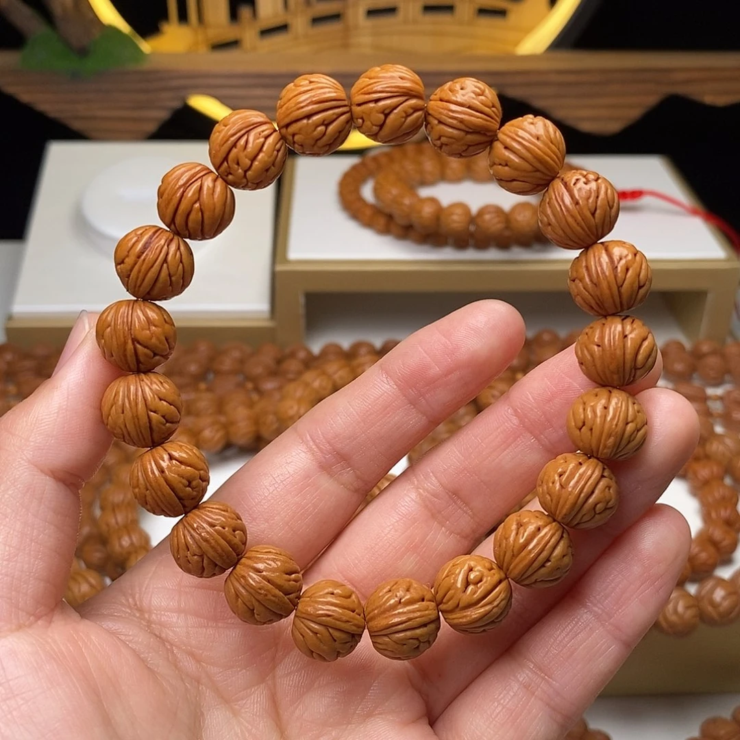i***儿手串桃核12mm野生金麒麟桃核手串