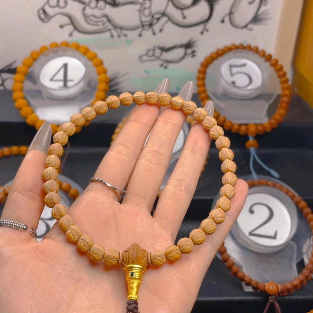 柏****文玩核桃吊坠0.777777777777