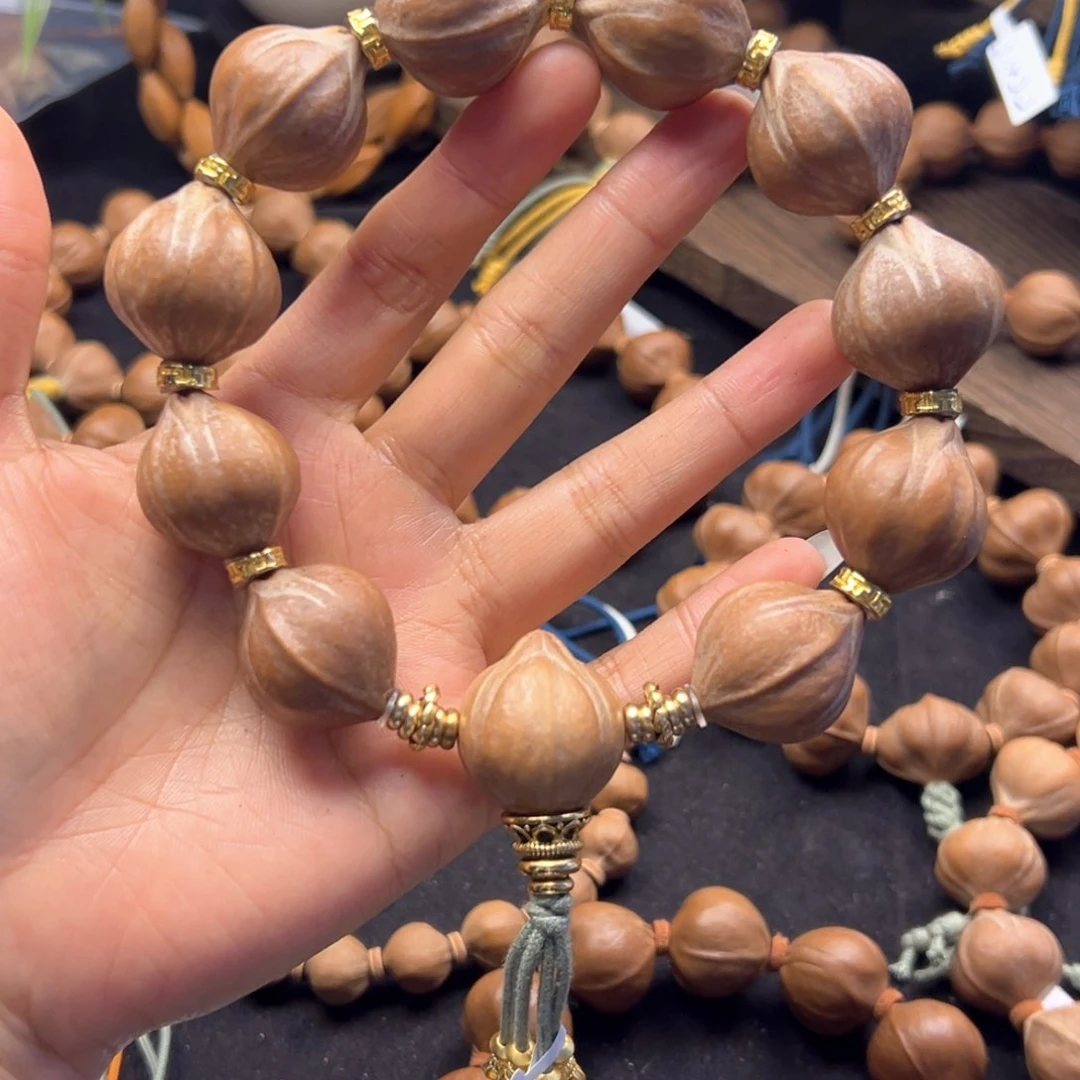 手串橄榄核23×26四花