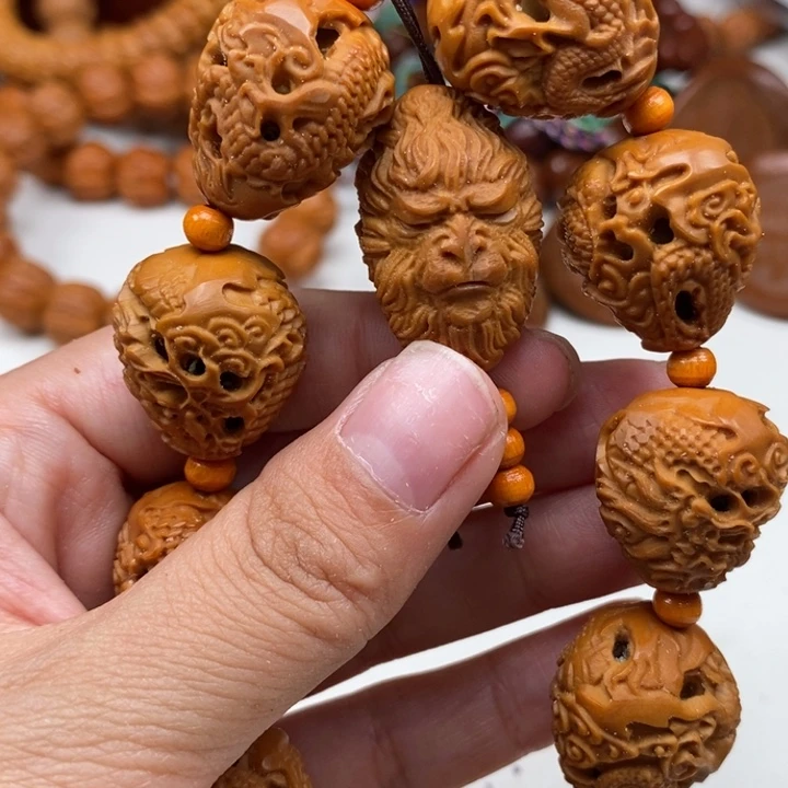 吊坠橄榄核九龙献瑞