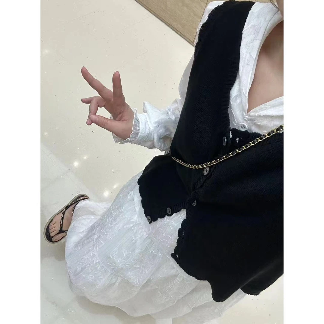 晶咕【花瓣】花边V领单排扣无袖针织背心百搭休闲宽松