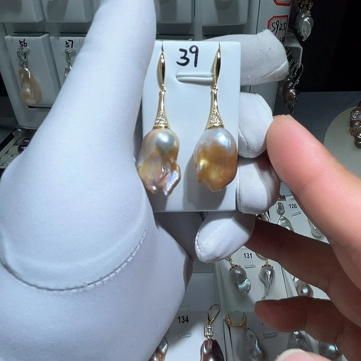 淡水珍珠耳饰银S925镶嵌菩***?