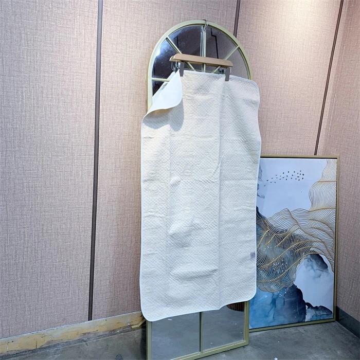 NN572米杏色彩棉隔尿垫70*120