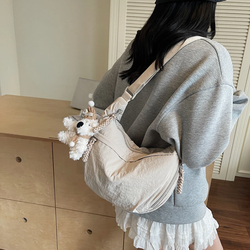 斜挎包饺子包包女式2025新款百搭休闲单肩背包大容量运动轻便小包