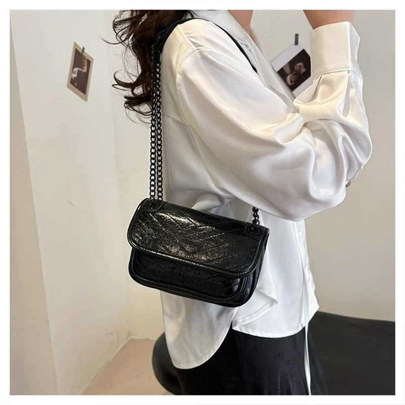 普拉琳2025春夏时尚潮流通勤女士手提斜挎包9648