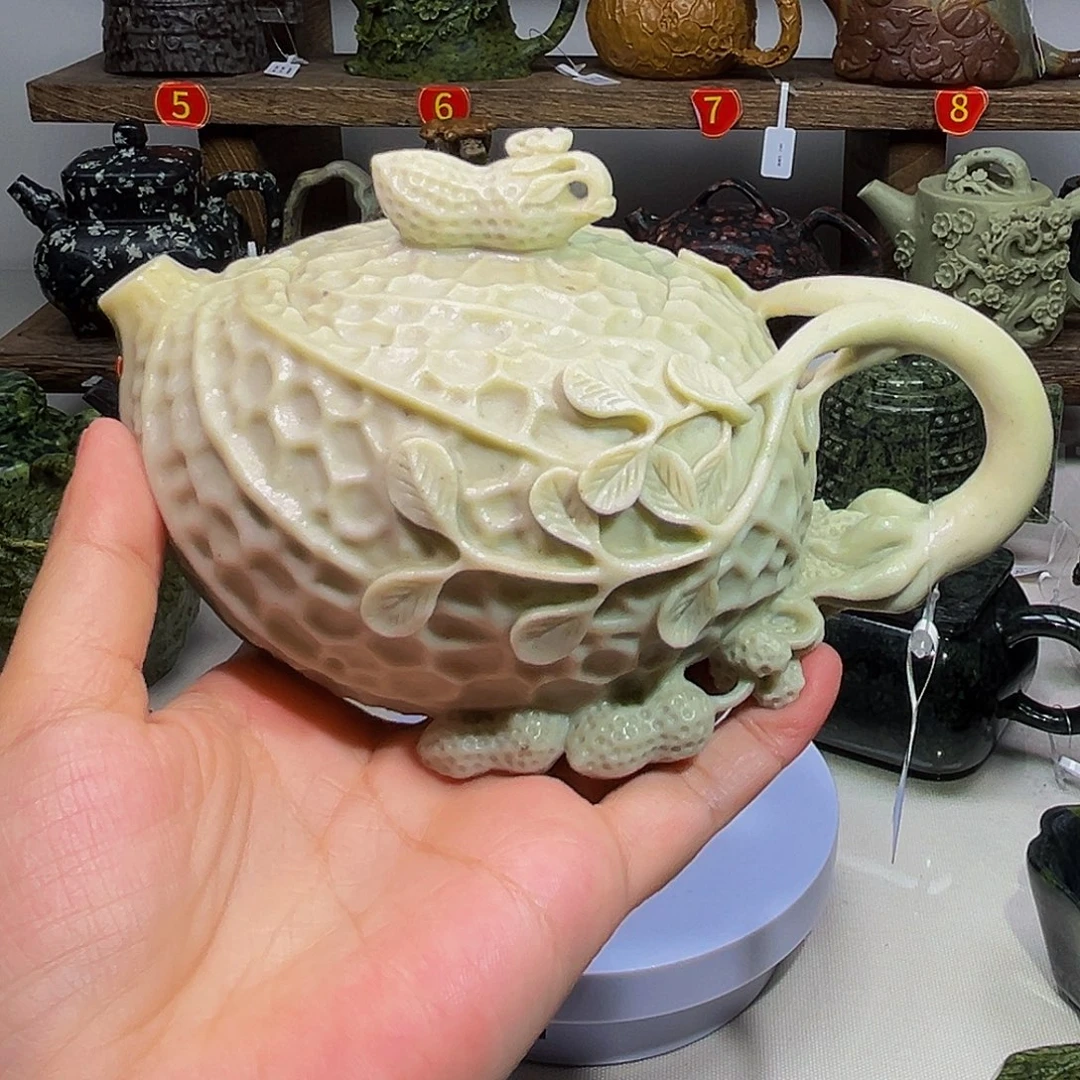 硕***父石材冰碛玉花生壶精品