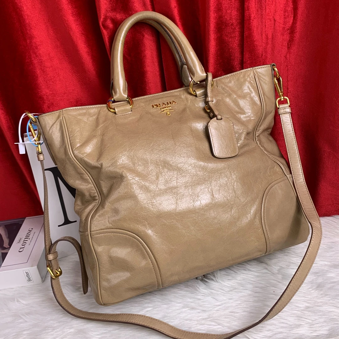95新 Prada/普拉达 奶茶色手提包/WJ09107019/7019