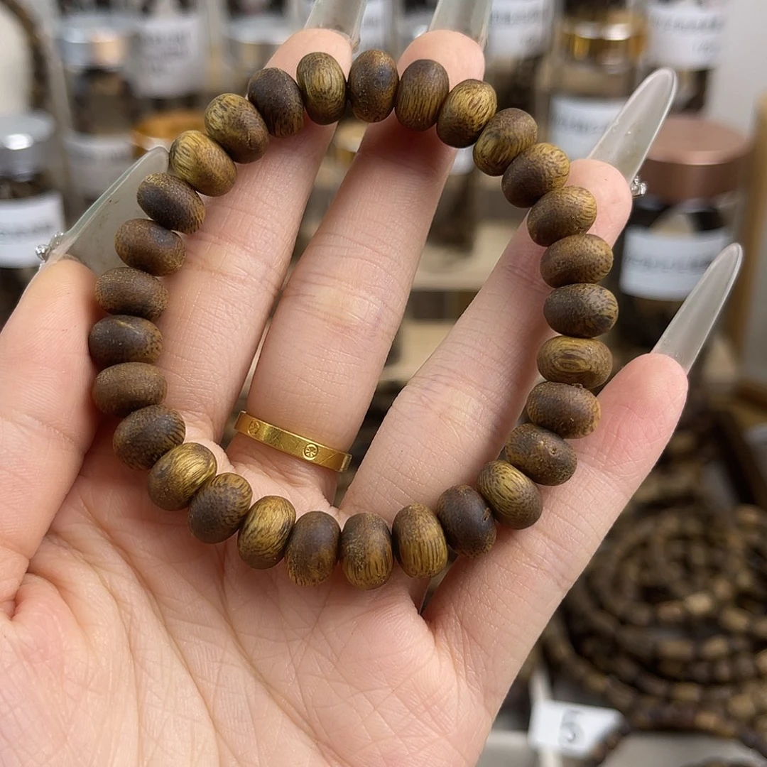 沉香碎屑沉香乌身圆叶算盘珠7g+