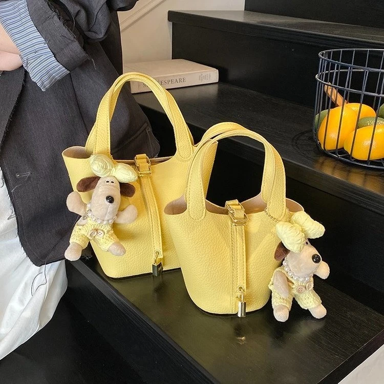 【漫威蒂尼】时尚经典简约风水桶包小众百搭手提包韩版通勤