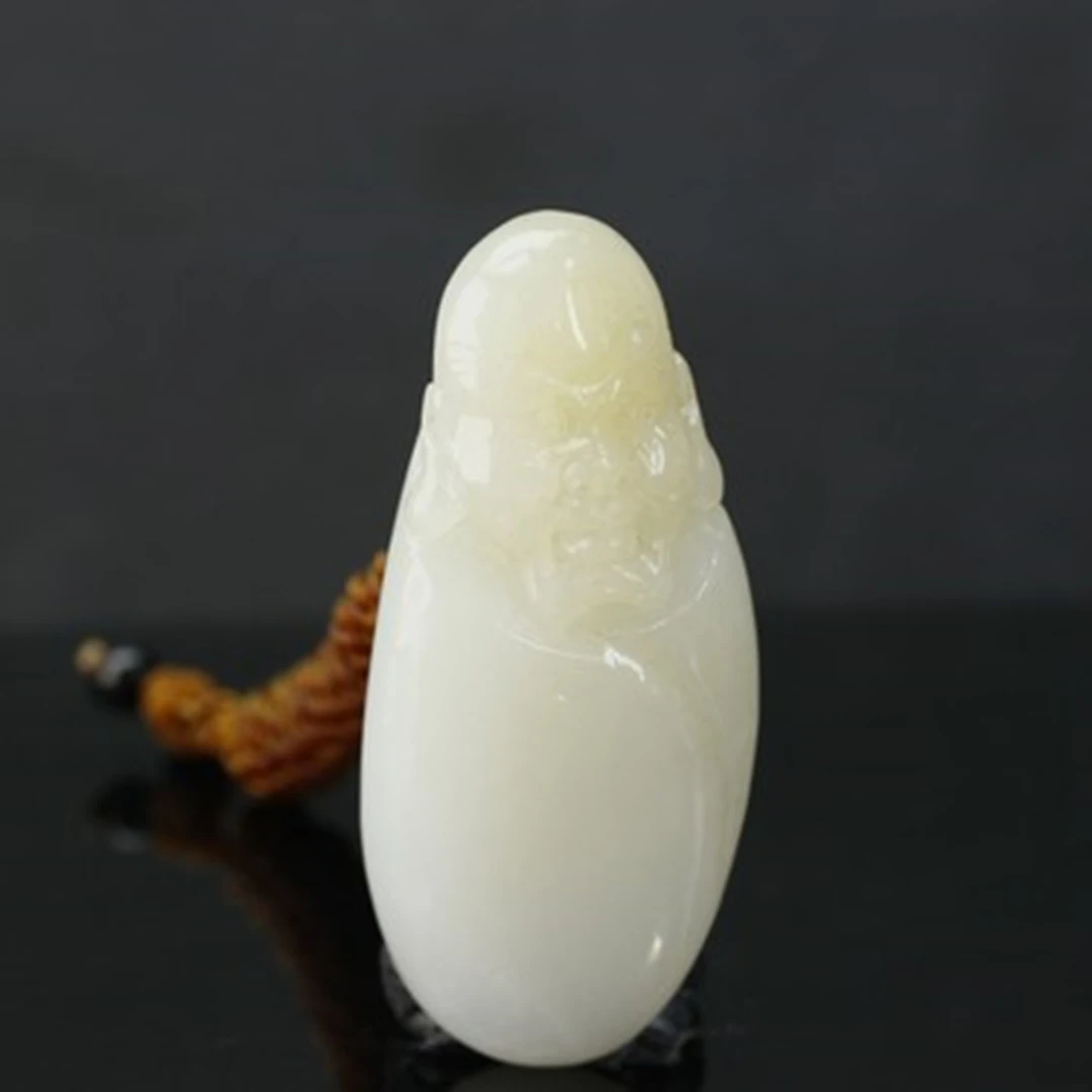 4和田玉蜂蜜水吊坠/800182保利厦门拍卖