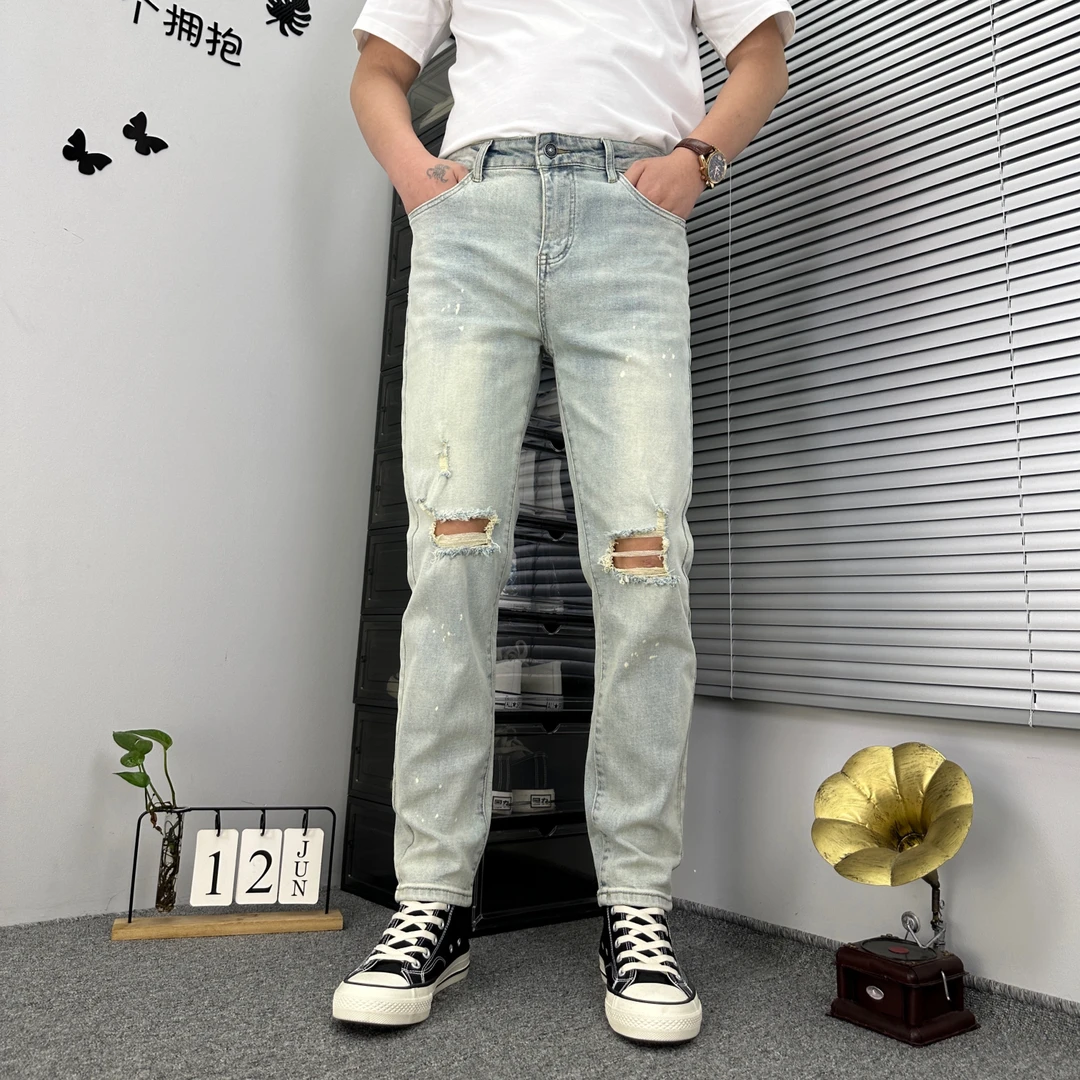 男士春夏新款浅蓝色破洞水洗个性点漆修身小脚时尚百搭牛仔裤韩版