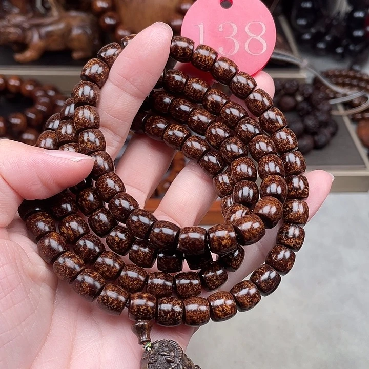 辉***贡木其他黑金火焰龙89