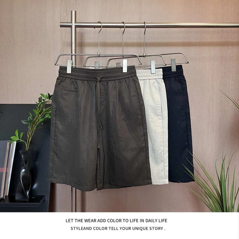 夏季男老钱风薄款透气天丝莱赛尔凉感透气简约阔腿裤宽松休闲短裤