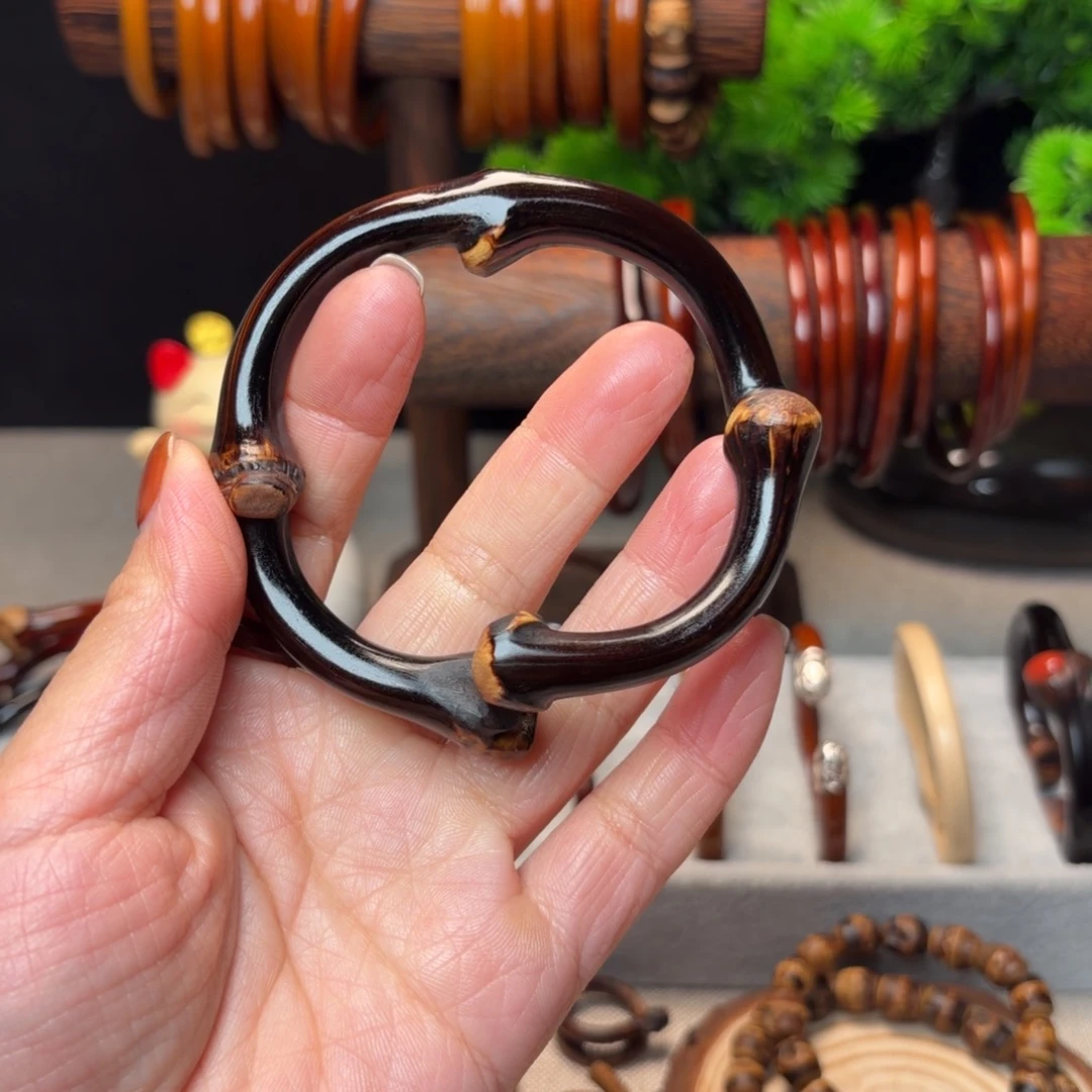 㜂***孞木质非金属黑藤手镯