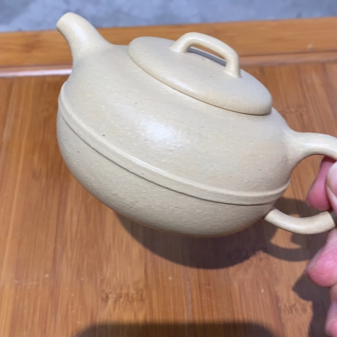 紫砂公道杯紫砂壶。紫砂壶