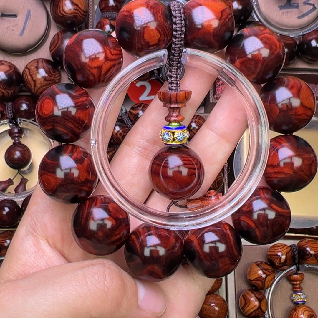 木质类黄花梨鬼脸对眼成品手串