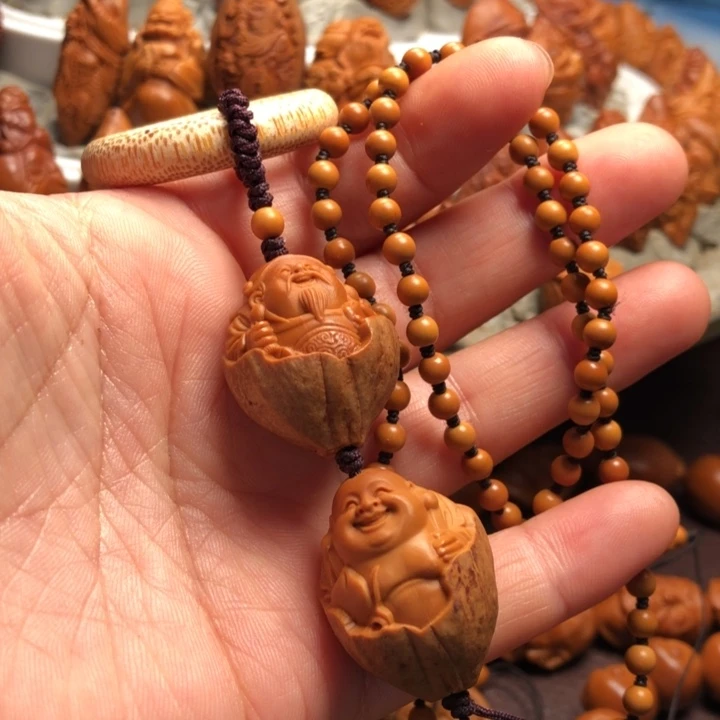 嫩***酱橄榄核吊坠橄榄核雕刻的单子