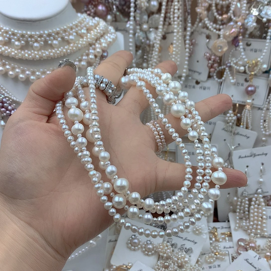 金***创银S925镶嵌淡水珍珠耳饰