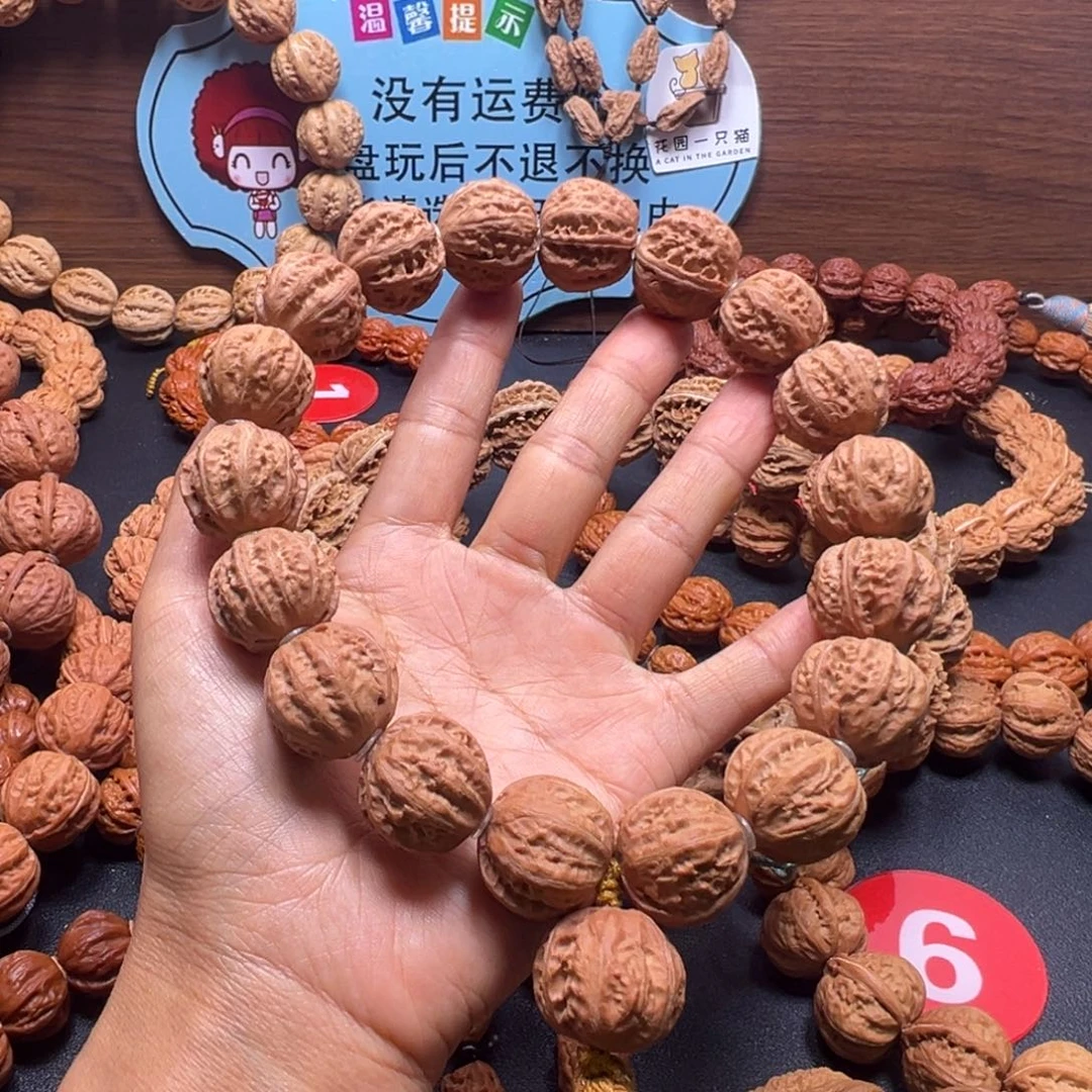 魏***锋文玩核桃吊坠野生小核桃21加