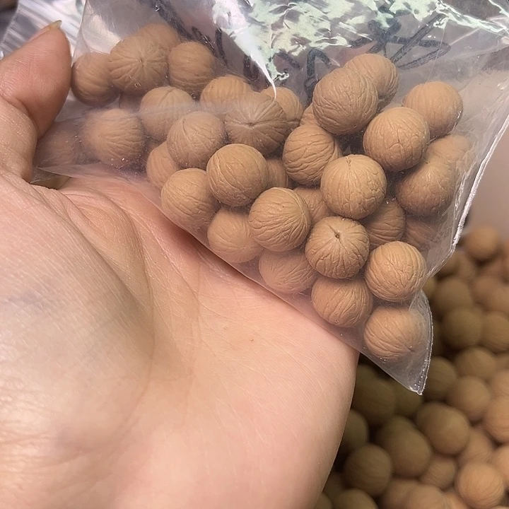 ｛***｝猴头核桃手串凤羽150颗