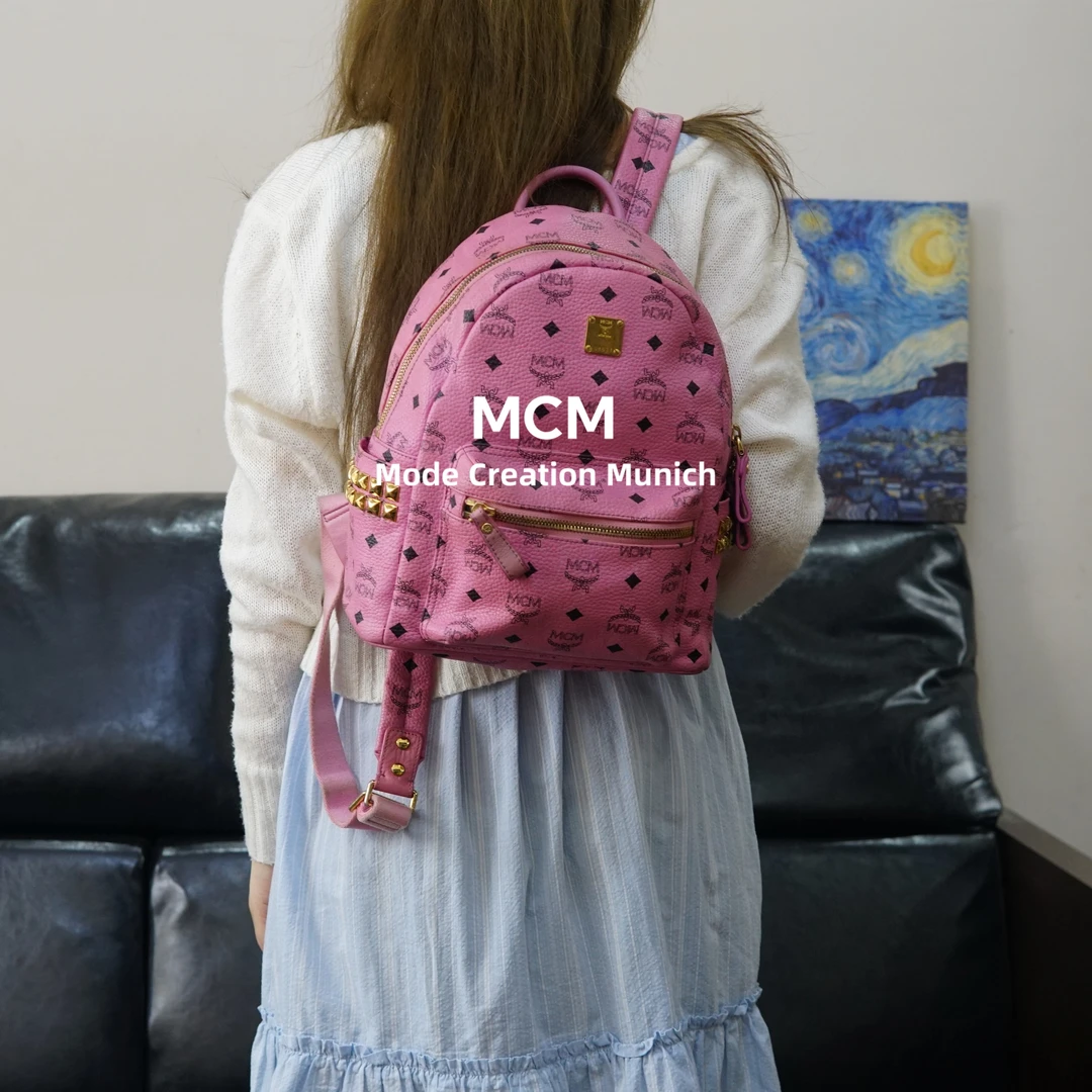 95新 MCM 粉色双肩包/WJ05424557/4557