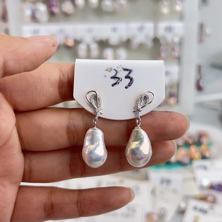 淡水珍珠耳饰银S925镶嵌D****?