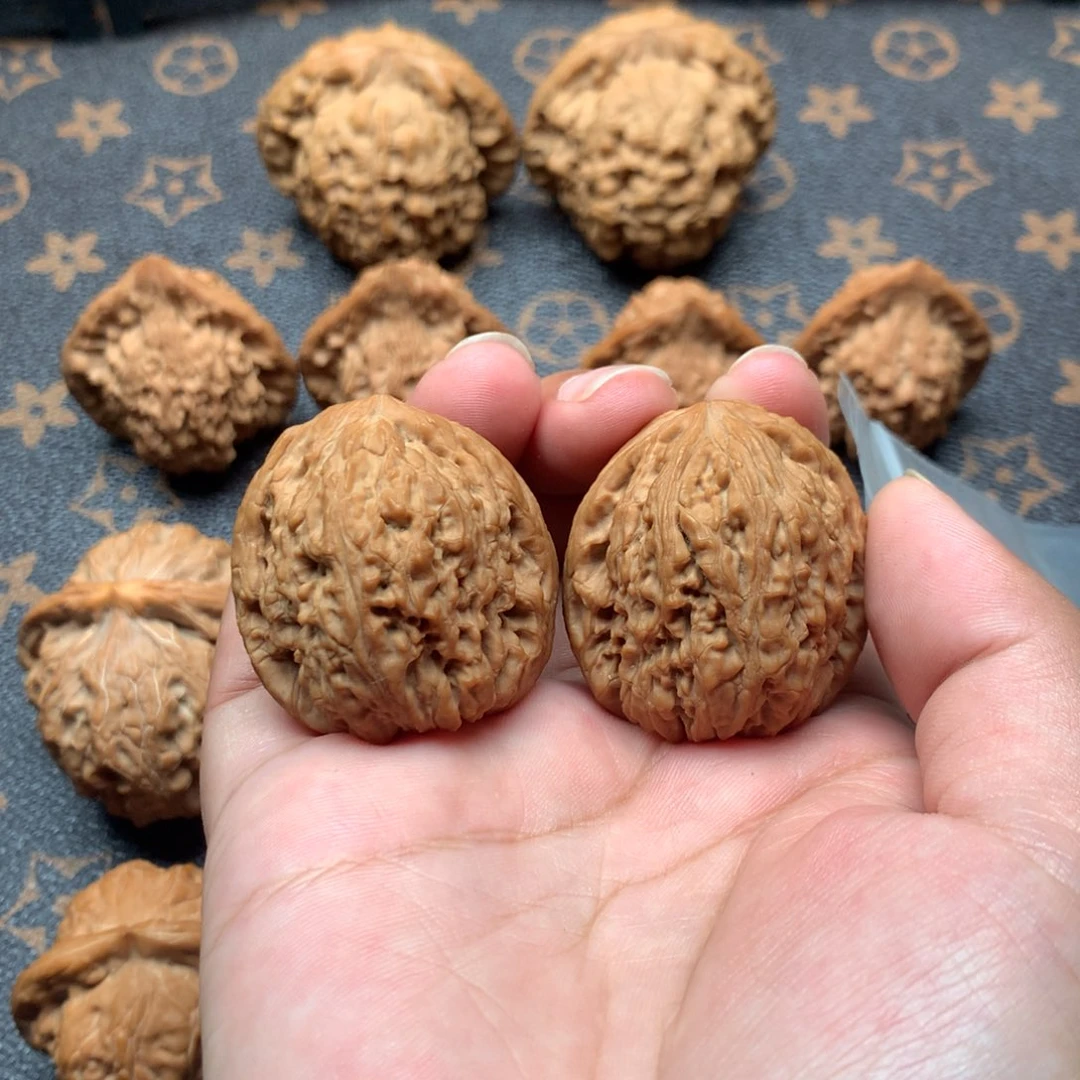 文玩核桃把件丑南疆