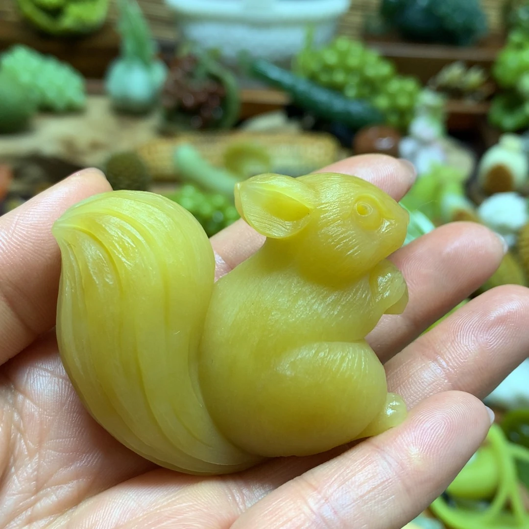 未镶嵌蛇纹石玉手把琬*