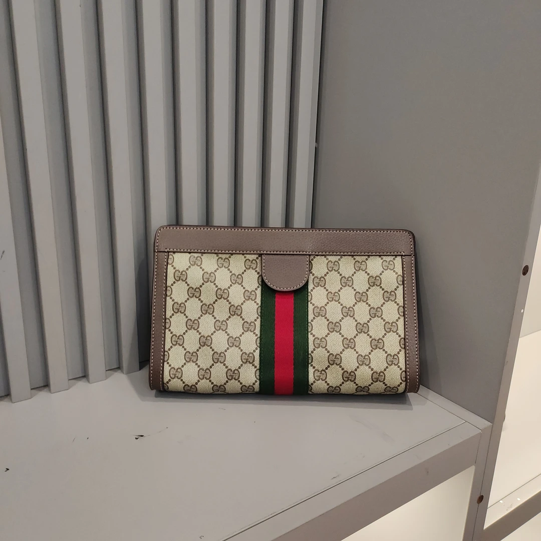 95新 GUCCI/古驰 兔兔奢轩轩/古驰手拿包/250103007