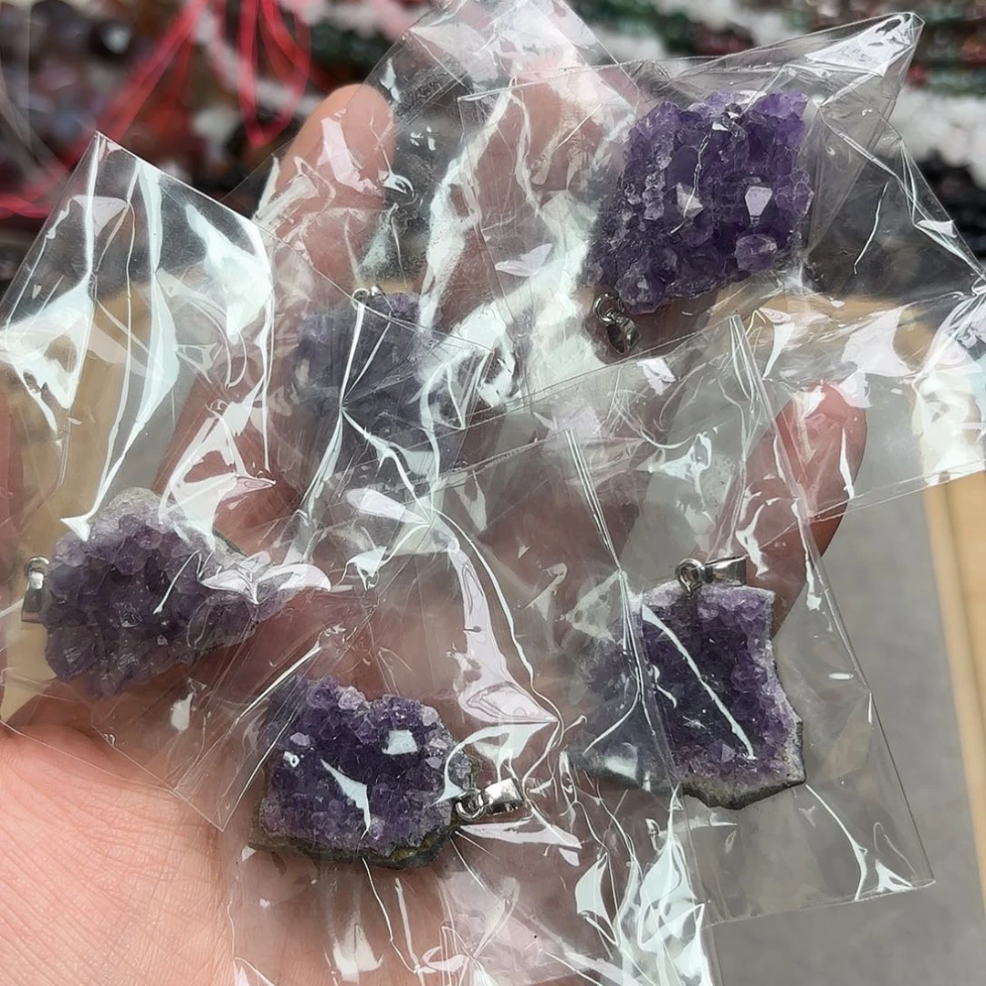 玛瑙/玉髓未镶嵌珠宝半成品紫晶牙原石吊坠一颗